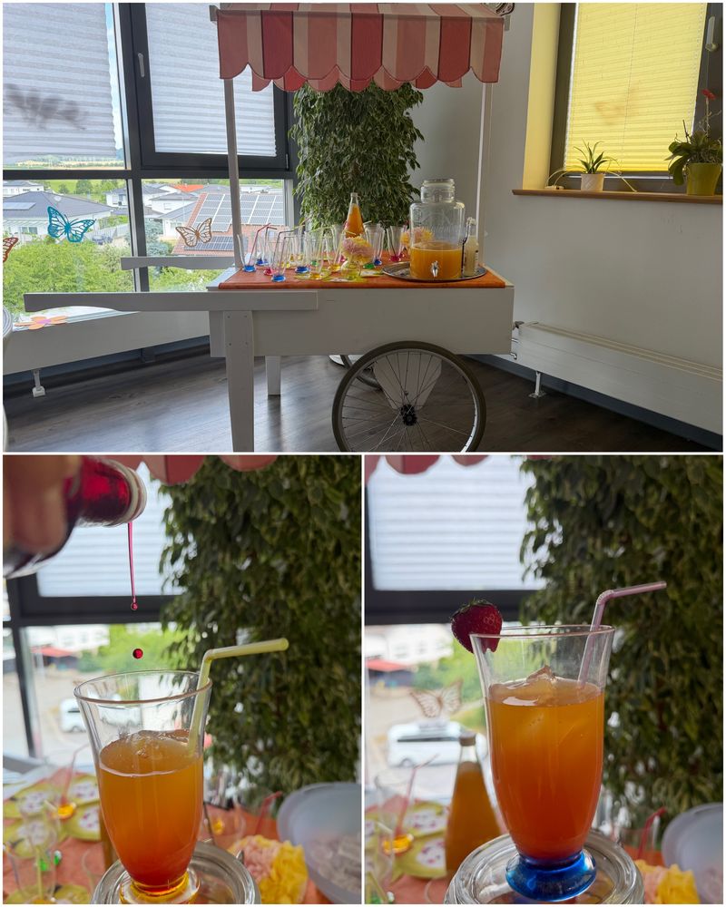 Servierwagen mit Glaskaraffe und alkoholfreien Cocktails mit Erdbeere